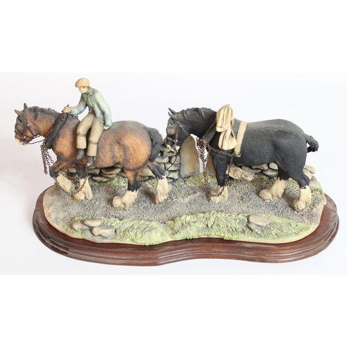 223 - Border Fine Arts group, Coming Home, two heavy horses and rider, on wooden plinth, L35cm