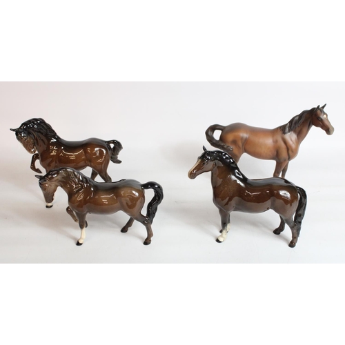 232 - Three Beswick brown horses and a Welsh Cob