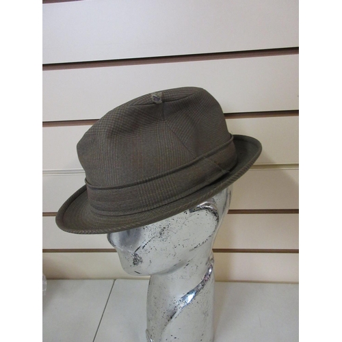 24 - Modern checked trilby hats, approx. 15