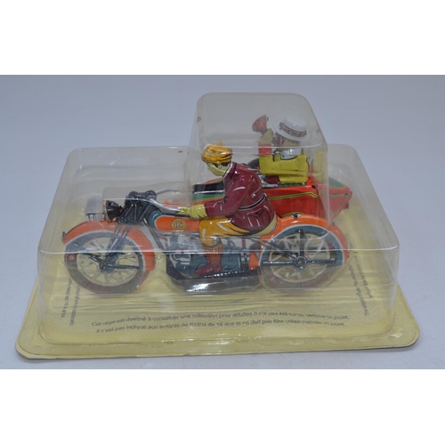 426 - Collection of modern and vintage tinplate bus, motorbike and car models, all A/F. (8)