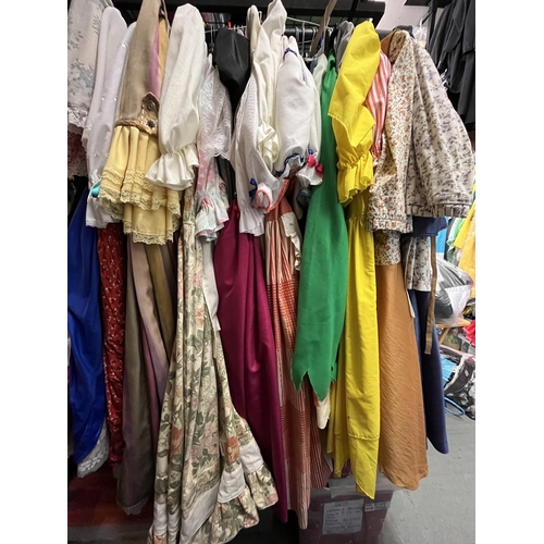 235 - Women's villager type pantomime dresses (approx. 40)