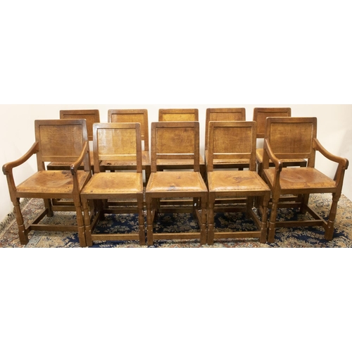 Robert "Mouseman" Thompson of Kilburn - set of ten (8 + 2) oak dining chairs, with adzed panel backs, and brass nail leather upholstered seats, on octagonal baluster and block supports joined by stretchers, carved with signature mouse (10)