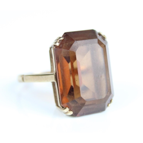 17 - Yellow metal ring set with large rectangular cut Citrine or smoky quartz, marks worn, size L1/2, and... 