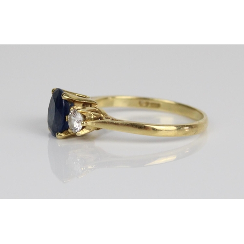3 - 18ct yellow gold sapphire and diamond ring, the central oval cut sapphire flanked on either side by ... 