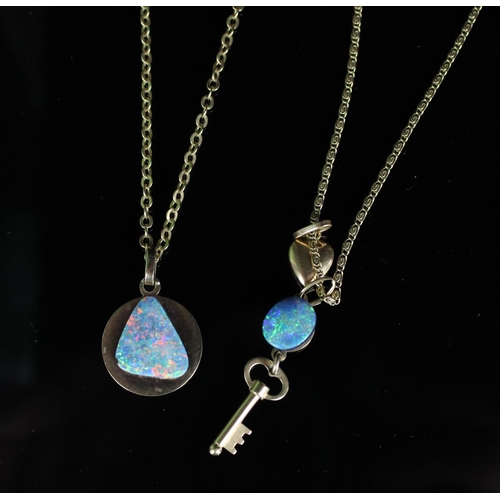 38 - Two yellow metal and opal pendants, one doublet cut opal with Ram design to the reverse with clasp m... 