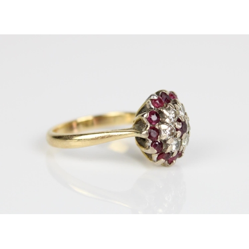 7 - 18ct yellow gold ruby and diamond cluster ring, stamped 750, size L, 5.3g