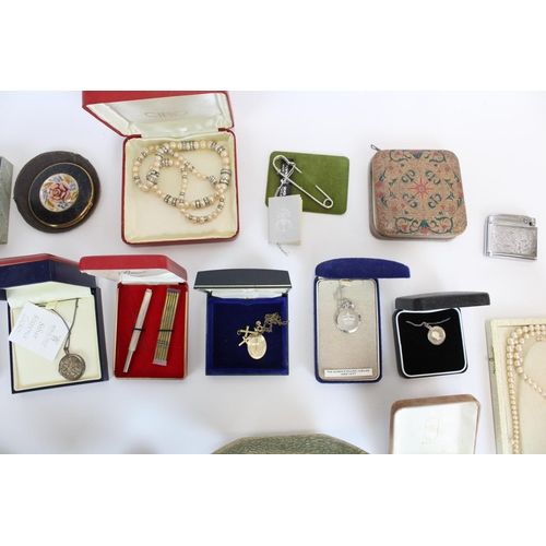 44 - Collection of costume jewellery pendants, brooches, simulated pearls etc. together with lighters and... 