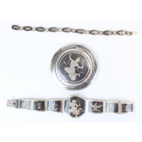 61 - Mid C20th Thai white metal and Niello compact with similar bracelets, various other costume jeweller... 