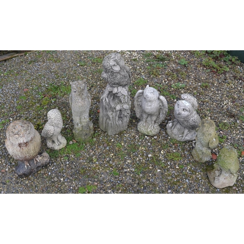 529 - Eight reconstituted stone owl garden ornaments