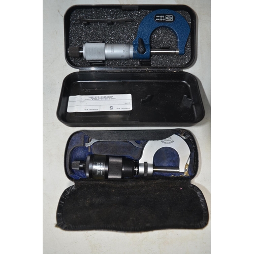 535 - Four Moore And Wright micrometers, all with original cases, a small set of calipers by King Dick, a ... 