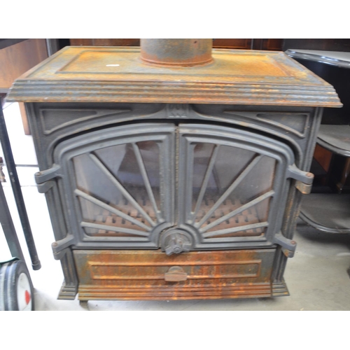 546 - French made Franco-Belge two door wood burning stove. Dimension from floor to stove top (not includi... 