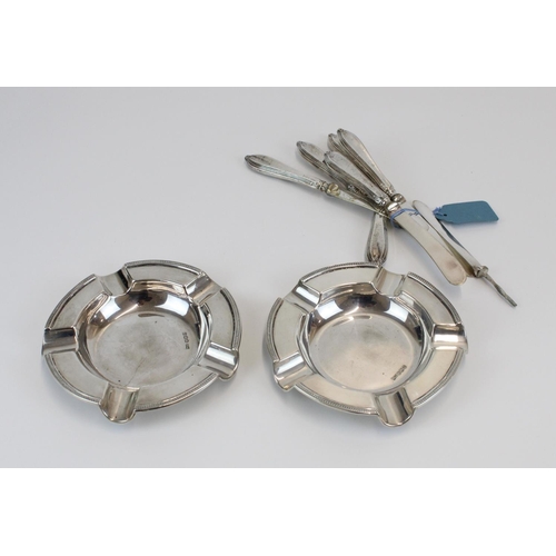 64 - Pair of Geo. V hallmarked silver ashtrays by Walker and Hall, Sheffield 1918, 7.1 ozt and six hallma... 