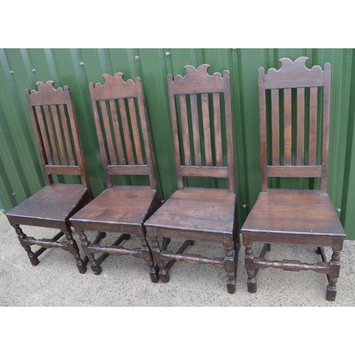 98 - Set of six C18th country made oak dining chairs, with slat backs and solid seats on turned supports ... 