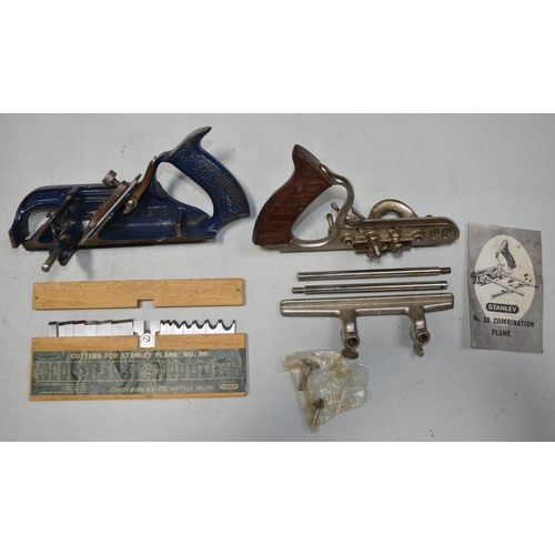 573 - Stanley No 50 combination plane with full set of cased cutters, with original box and a Record plane