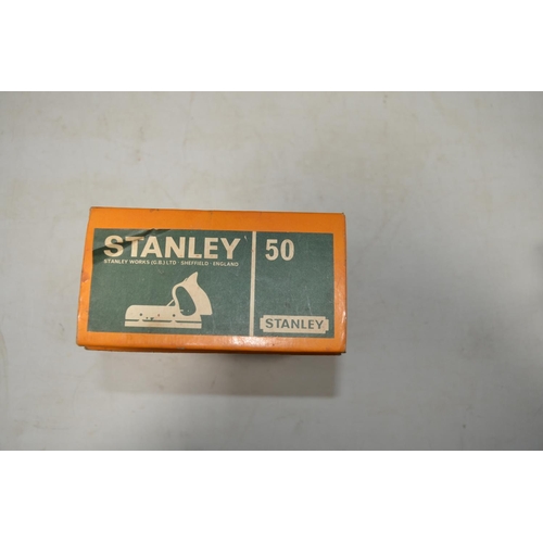 573 - Stanley No 50 combination plane with full set of cased cutters, with original box and a Record plane