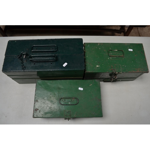 595 - Two vintage top opening metal tool chests containing a quantity of painting and decorating tools, pa... 