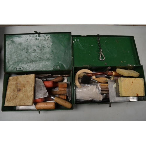 595 - Two vintage top opening metal tool chests containing a quantity of painting and decorating tools, pa... 