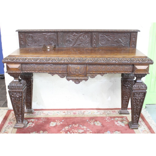 497 - Victorian Jacobeathan revival oak side table, raised back carved with scrolls and foliage, on square... 