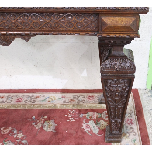 497 - Victorian Jacobeathan revival oak side table, raised back carved with scrolls and foliage, on square... 