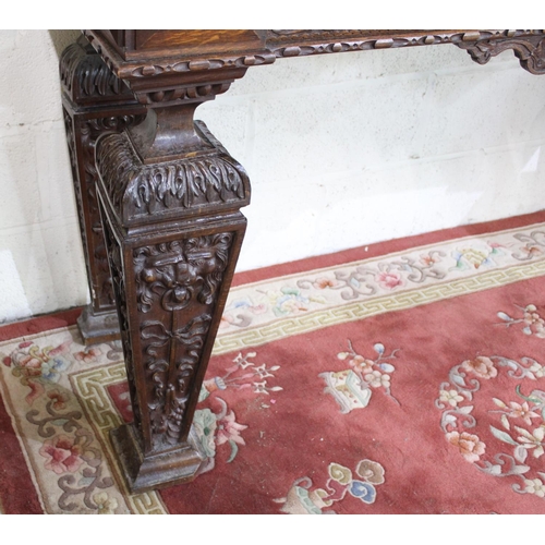 497 - Victorian Jacobeathan revival oak side table, raised back carved with scrolls and foliage, on square... 