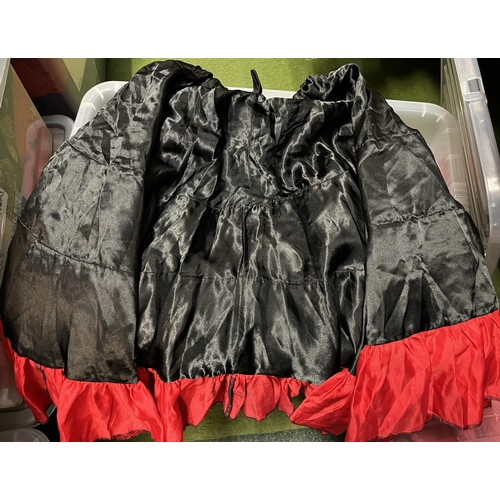 556 - Large box of can-can skirts and bodices in red and black