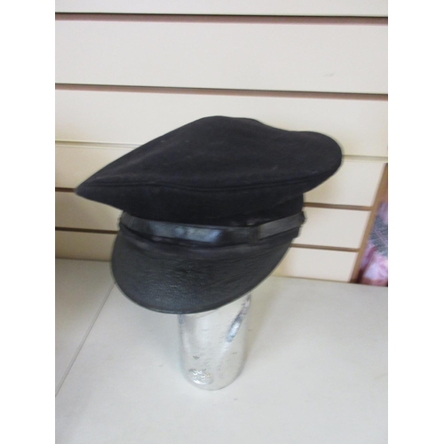 293 - Collection plain black and navy blue peaked caps (1 bag)