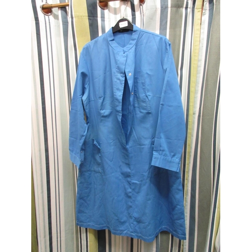 299 - Collection of nurses uniforms, various styles and sizes (34)