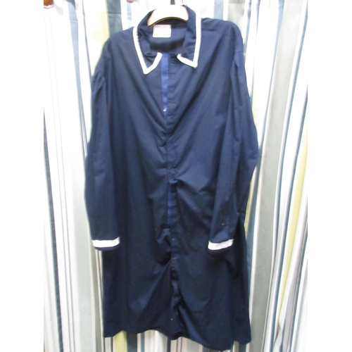 299 - Collection of nurses uniforms, various styles and sizes (34)