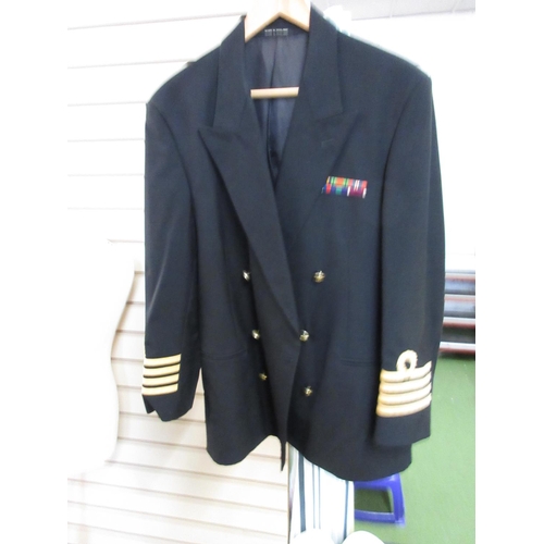 827 - Navy and RAF blue/navy jackets and blazers and two blue RAF jumpers, approx. 18