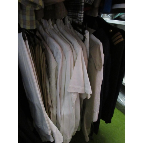 829 - White/beige military shirts, jackets, trousers and three dark blue jackets