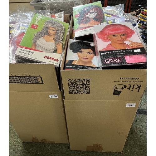 426 - Large quantity of various fancy dress wigs, as new in original packaging (2 boxes)