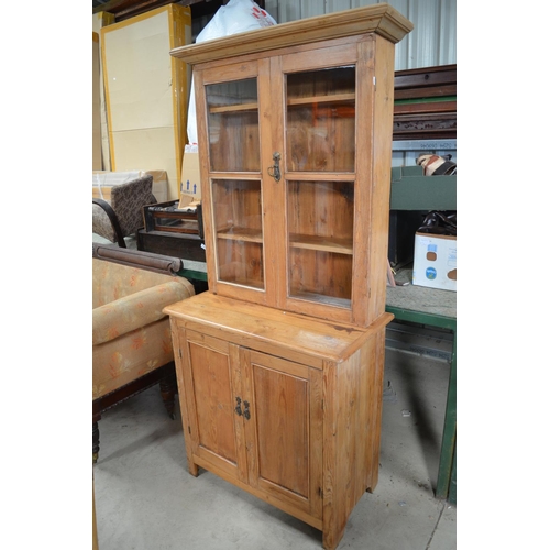 476 - Vintage waxed pine side cabinet, moulded cornice and two glazed doors above two panel doors, W95cm D... 