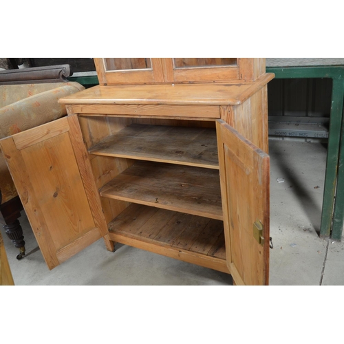 476 - Vintage waxed pine side cabinet, moulded cornice and two glazed doors above two panel doors, W95cm D... 