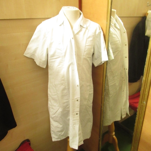 124 - White uniform dresses and a white sleeveless coverall (6)