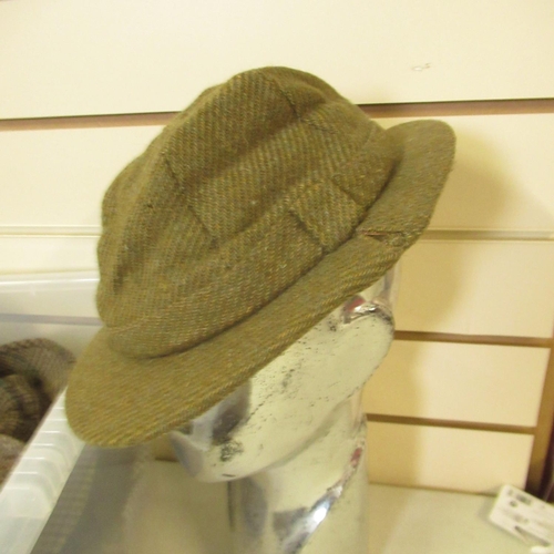 72 - Checked tweed and other hats, predominantly deerstalkers, approx. 20