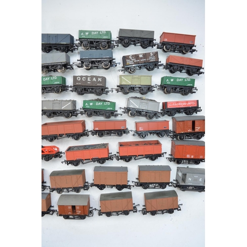 125 - Collection of Fifty four used OO gauge goods wagons, some re-painted. Condition varies, please refer... 