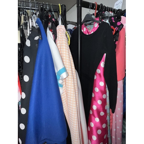 546 - 1950s style dresses and a quantity of 1950s/60s vintage and modern full circular skirts (on rail and... 