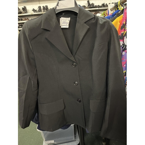 553 - Large quantity of ladies black trouser suits, with elasticated waists