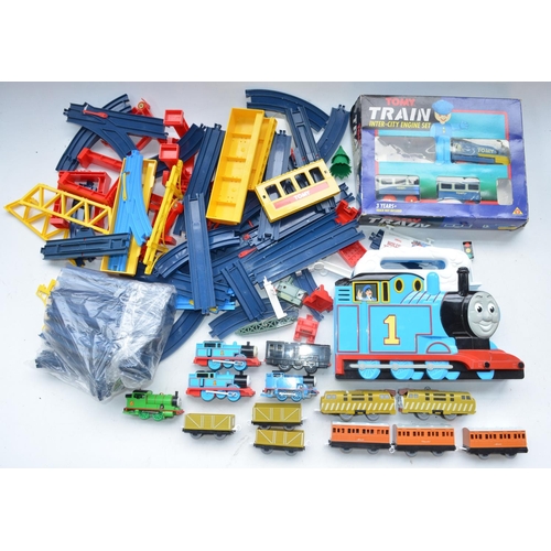 219 - Collection of children's train play sets and models in various scales and gauges to include Merit ba... 