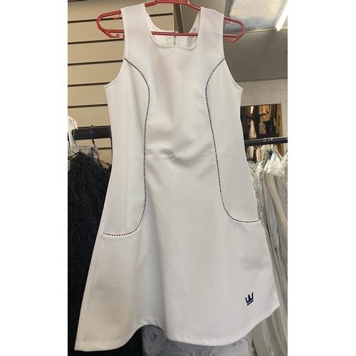 775 - Women's white tennis dresses and skirts, approx.15 total, and a quantity of sailor style dresses and... 