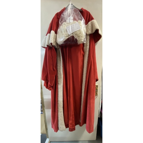 226 - Collection of Christmas costumes and accessories including Santa costume with hat, wig, and beard, e... 