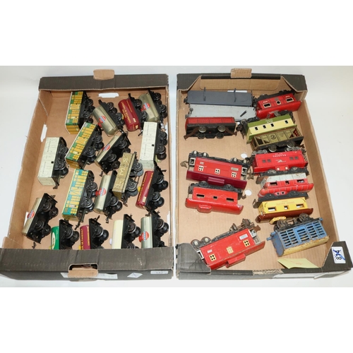 142 - Hornby tin plate 0 gauge rolling stock incl. tanker wagons, refrigerator wagons and other 0 gauge ro... 