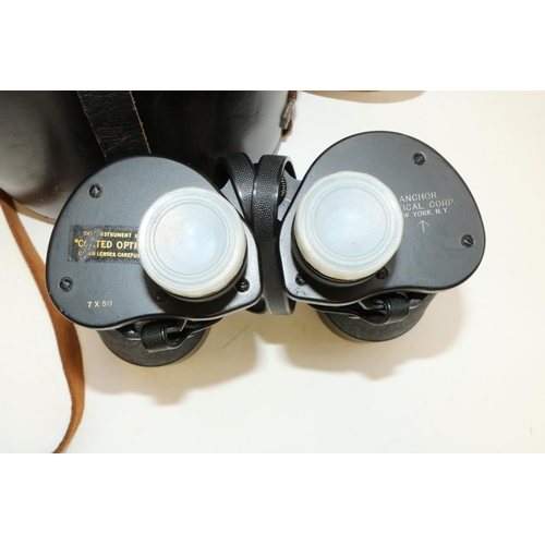 1388 - Pair of WW11 7x50 binoculars by Anchor Optical Corp, New York, N.Y. with coated lenses, in black lea... 