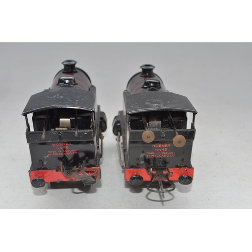 230 - Two vintage Hornby Meccano O gauge Type 40 0-4-0 clockwork tank engines in BR black, one boxed with ... 