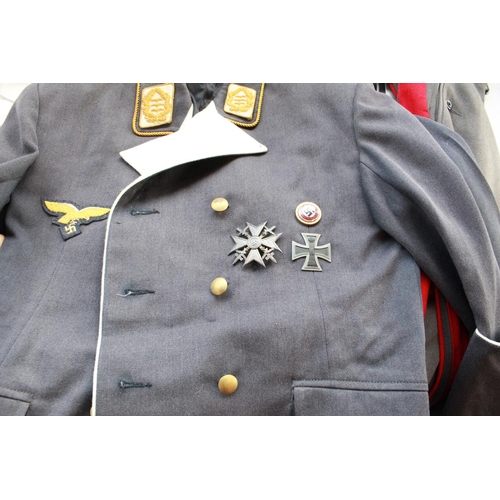 849 - Large collection of German military uniform including Luftwaffe tunic, officers tunic with insignia,... 