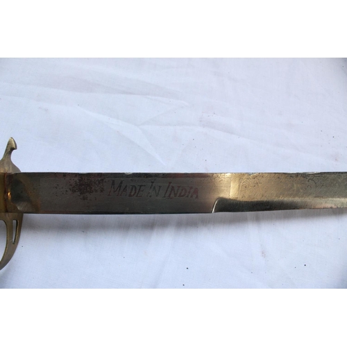 871 - Reproduction Indian made sabre in original velvet covered scabbard