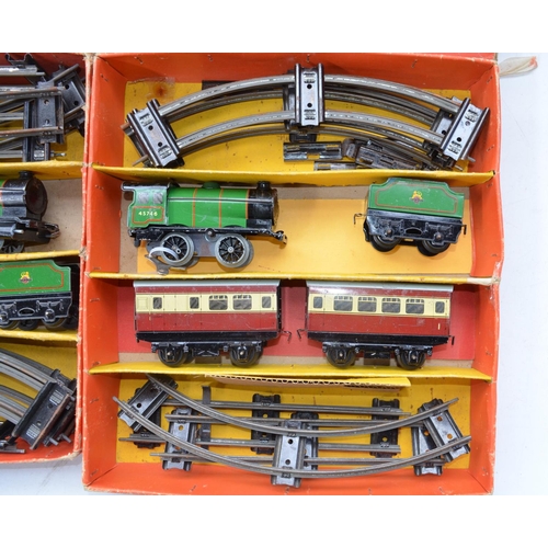 327 - Two boxed Hornby O gauge clockwork train sets (21 and 31), passenger and goods, both with 0-4-0 4574... 