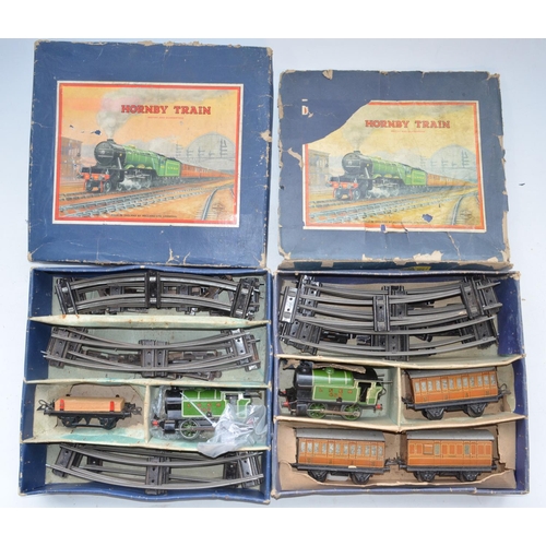 331 - Two boxed Hornby O gauge clockwork train sets with 0-4-0 LNER 460 tank engines, one key between the ... 