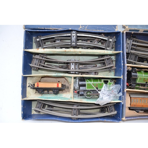 331 - Two boxed Hornby O gauge clockwork train sets with 0-4-0 LNER 460 tank engines, one key between the ... 