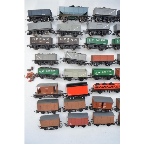 125 - Collection of Fifty four used OO gauge goods wagons, some re-painted. Condition varies, please refer... 